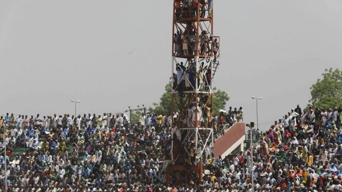"Crazy Buharists are everywhere'' Lauretta Onochie says as she shares photos of Bauchi residents that climbed poles to catch a glimpse of President Buhari