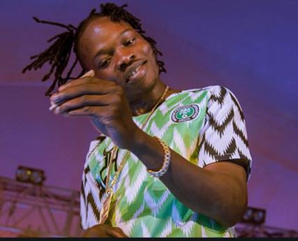 'Stupid b!tch who’s your baby?' - Naira Marley drag fans who called him illiterate on Twitter