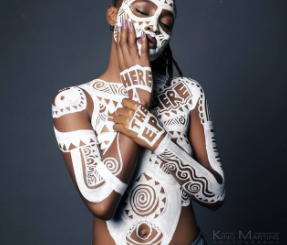 Ex BBN housemate, Marvis poses completely topless with body paint in new photos