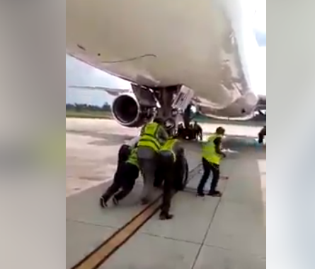 Wonders shall never end - Man expresses surprise at seeing Nigerian airport officials push an airplane (video)